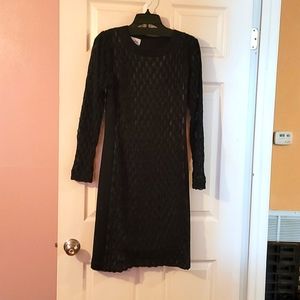 Sara Cambell Black over nude lace dress.